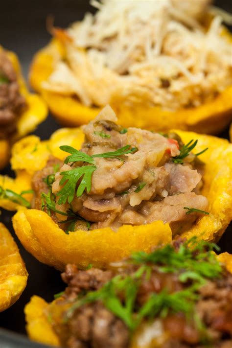 Peel plantains and cut them into thick disks. 40 Delicious Puerto Rican recipes | MamasLatinas.com