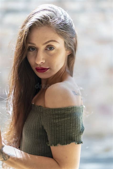 a lovely brunette model enjoys an spring day outdoors stock image image of feminine hair