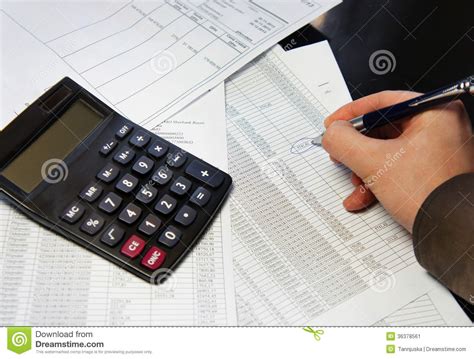 Office Table With Calculator Pen And Accounting Document Stock Image