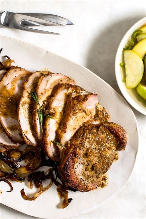 Cantonese roast pork belly, or siu yuk, can be found in many chinatown restaurant windows, but with our recipe, you can make it at home! NYT Cooking: Roasting a pork loin on a bed of apples, onions and cinnamon moistened with cider ...