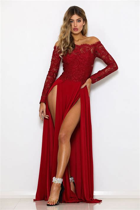elegant off the shoulder long sleeve lace gown with an a line skirt and double slits red lace