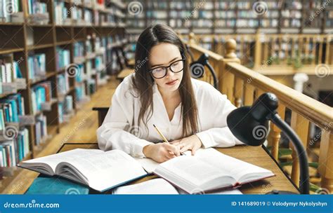 Student Studying At The Library Stock Image Image Of Literature
