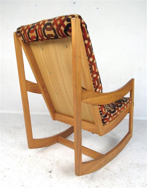 Vintage rocking chairs are beautiful and functional, but modern options offer a different set of advantages, such as less jerky motion for a a good rocking chair needs to be durable. Danish Modern Teak Rocking Chair For Sale at 1stDibs