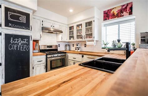 White, long kitchen cabinet with a beige countertop. How to Organize a Small Kitchen - Designing Idea
