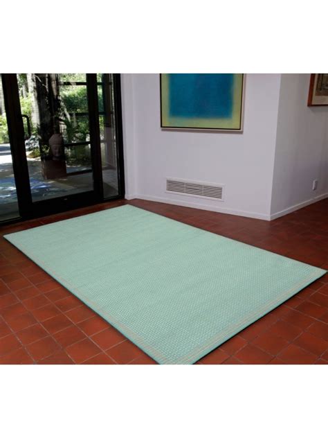 An indoor/outdoor rug is an easy way to add a pop of color to your porch, deck, or pool area. Weaver Aqua Indoor/Outdoor Rug | Cottage Home®