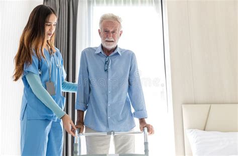 Caregiver Nurse Take Care A Senior Patient Nurse Helping Senior Man
