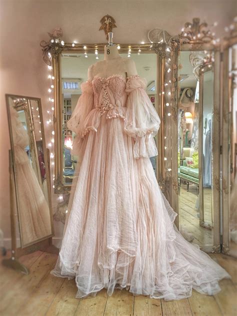 Get ready to say yes! to the dress. Blush Tulle and Lace Wedding Dress with Detachable Sleeves