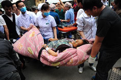 Rescuers Battle To Help Victims Of Sichuan Quake As Death Toll Hits 188
