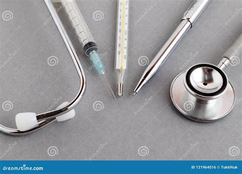 Medical Equipments Including Stethoscope Syringe Medicines Background