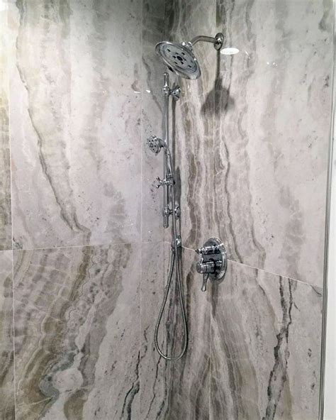 Before i even type anything else…tile leveling systems are optional. 24x48" Onyx look porcelain large format tile shower ...