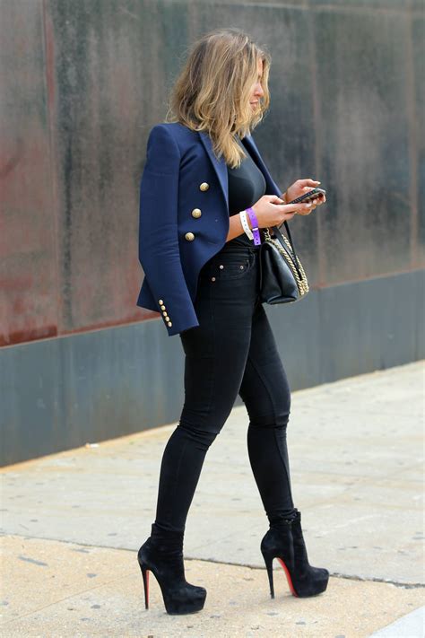 eleonora srugo in a sky high stiletto boots and tight jeans during new york fashion week