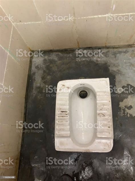Image Of Traditional Indian Floor Toilet In A Public Restroom Bathroom