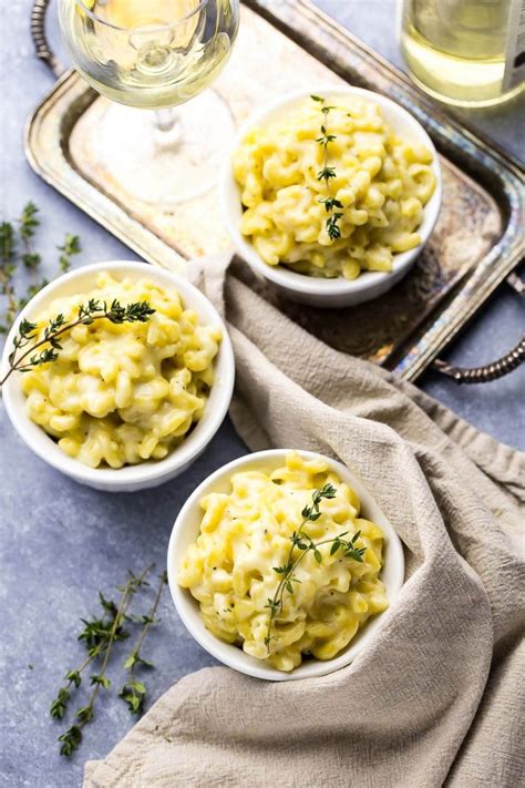 Season sauce with nutmeg and cayenne. White Cheddar Truffle Mac and Cheese | The Girl on Bloor