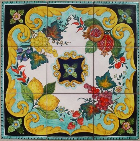 A Colorful Tile With Flowers And Leaves On It
