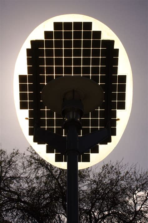 Solar Panels On A Streetlight Soak In The Days Sun And In Turn Will
