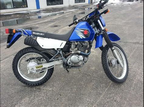 The e stands for electric start, but that designation is meaningless anymore. Buy 2007 Suzuki DR200SE Dual Sport on 2040motos