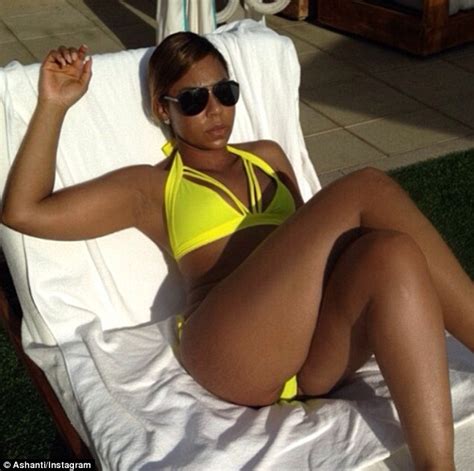 Ashanti Shares Poolside Pictures Of Her Impressive Bikini Body Daily Mail Online