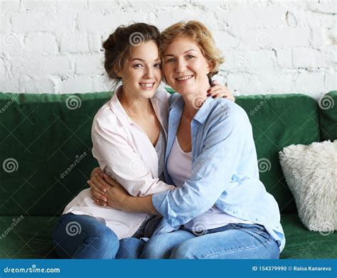 Adult Babe Hugs Mom And Both Are Smiling At The Camera Stock Photo My XXX Hot Girl
