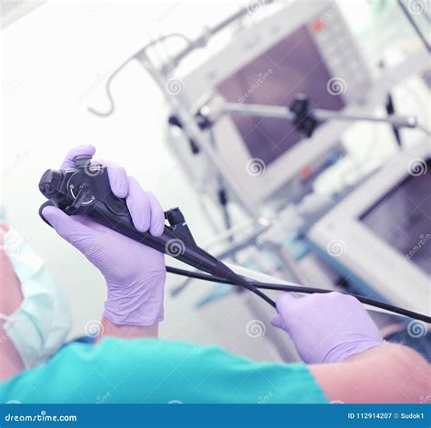 Doctor During Endoscopy Checking Picture Of Mouth On Screen Stock Image