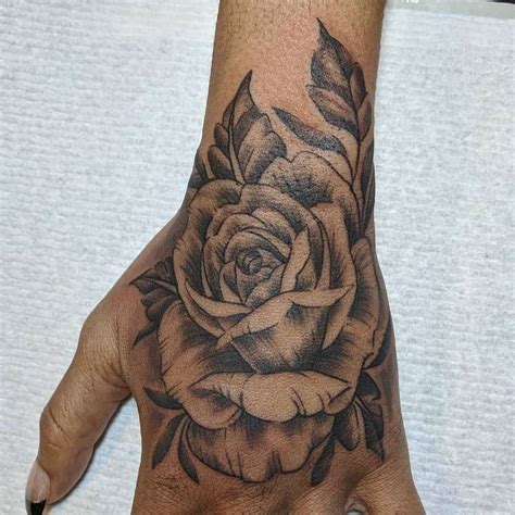 Rose Hand Tattoo Designs