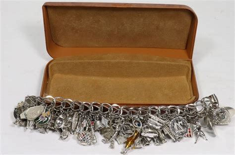 1970s Sterling Silver Charm Bracelet With Large Kastner Auctions