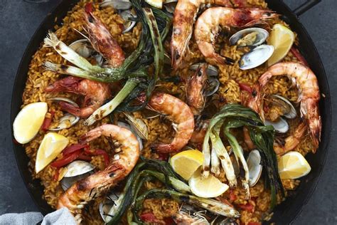 Paella is meant to show off the rice itself and to highlight a few special ingredients. Winter Paella Party (Plus a Dinner Party Menu) - What's ...
