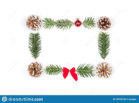 Christmas Frame Of Pine Cones And Fir Branches On A White Background