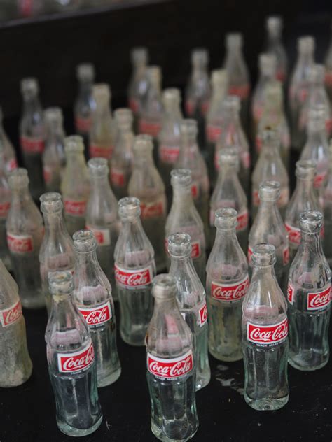 The stock's open price was 54.51. stock vintage bouteille en verre miniature coca cola