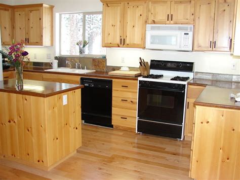 Solid wood kitchen cabinet we are professional manufacture focusing on mdf,kitchen cabinet ,slatwall,film faced plywood and relative products since year 2003. Knotty Pine Kitchen - Traditional - Kitchen - San ...