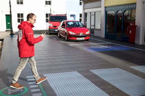 High Tech Pedestrian Crossing Lights Up When Person Using A Mobile
