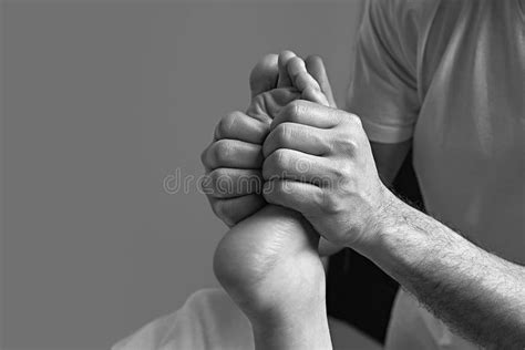 Male Masseur Doing Massage On Female Foot Reflex Zone In The Spa Salon Stock Image Image Of