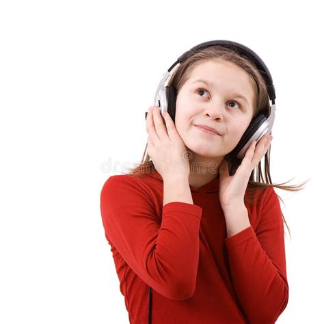 Niña Linda Que Disfruta De Música Usando Los Auriculares Foto De