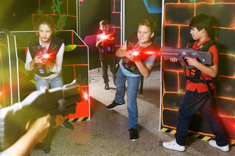 Kids Playing Laser Tag On Labyrinth Stock Photo Image Of Emotion
