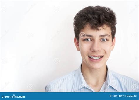A Cute Guy Smiles At The White Background Stock Image Image Of