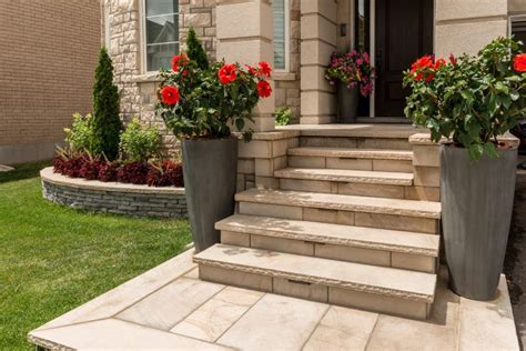 Front Entrance With Natural Stone Steps And Rivercrest Retaining Wall