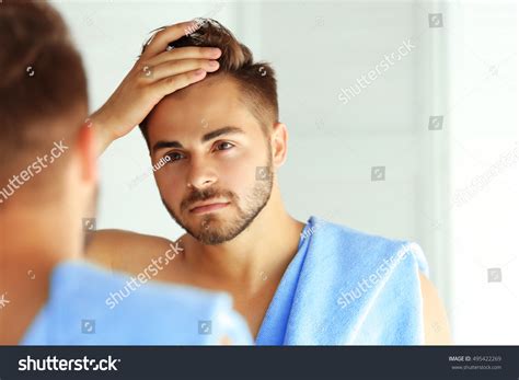 Handsome Unshaven Man Looking Mirror Stock Photo 495422269 Shutterstock