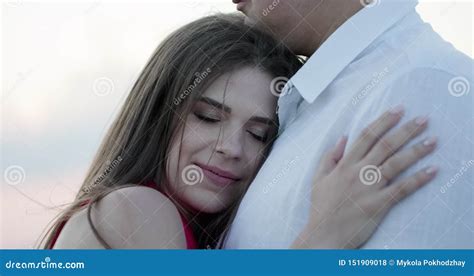 romantic couple kissing each other beautiful romantic man and woman embrace and share a kiss on
