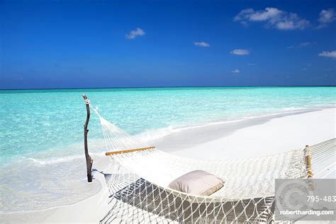 Hammock On Tropical Beach Maldives Stock Photo