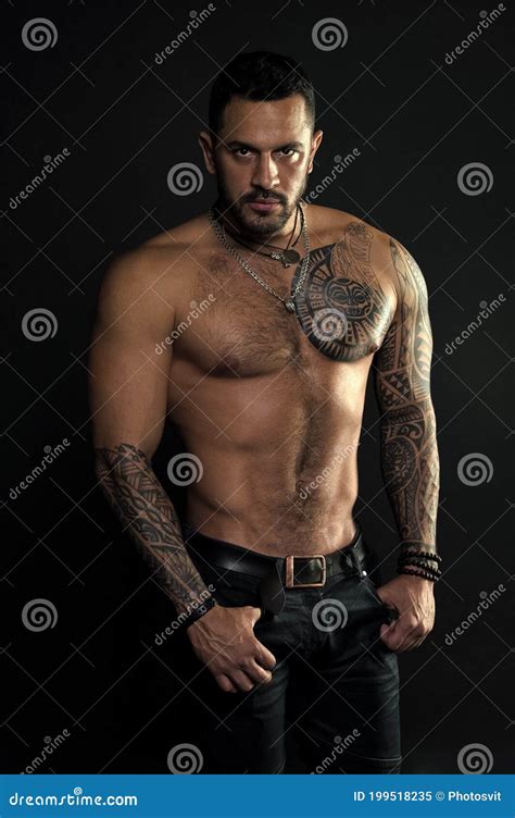 Sport And Fitness Masculinity Muscular Torso Jewelry For Real Men Bearded Man With Tattooed