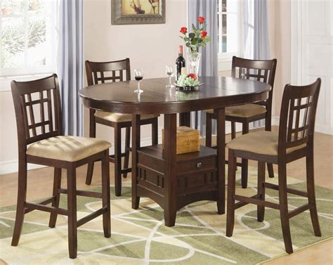 An intricate metal base and round table top define this contemporary counter height dining set. Coaster Lavon Round Counter Height Dining Set - Cherry ...