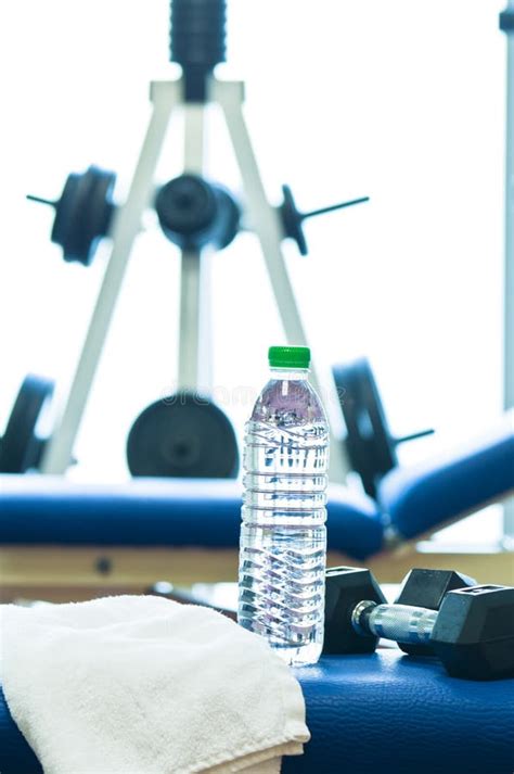 Weights Stand Bench Of A Gym Towel Water Bottle Stock Photo Image
