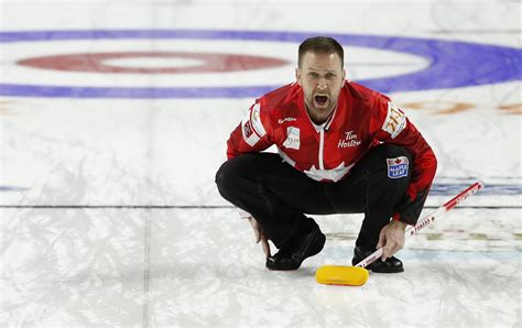 Canada Skip Brad Gushue Directs Sweepers During A Qualification Game