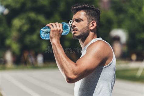 Sporty Young Man Drinking Water Stock Photo Image Of Water Athlete
