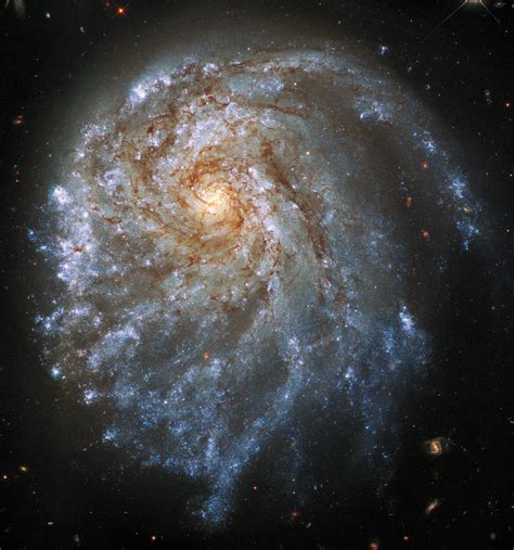 Spectacular Image Captured By Hubble Shows A Strangely Contorted Spiral