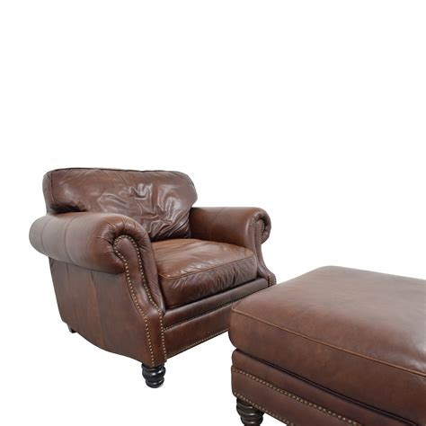 Button tufting adorns the seat and footrest for some textural appeal. 75% OFF - Brown Leather Studded Armchair with Matching ...