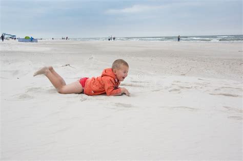 227 Little Boy Laying Beach Stock Photos Free And Royalty Free Stock