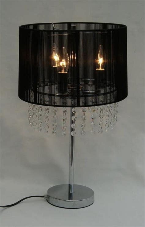 Maybe you would like to learn more about one of these? 21" Crystal Chandelier Silver Finish Table Lamp + Black or ...
