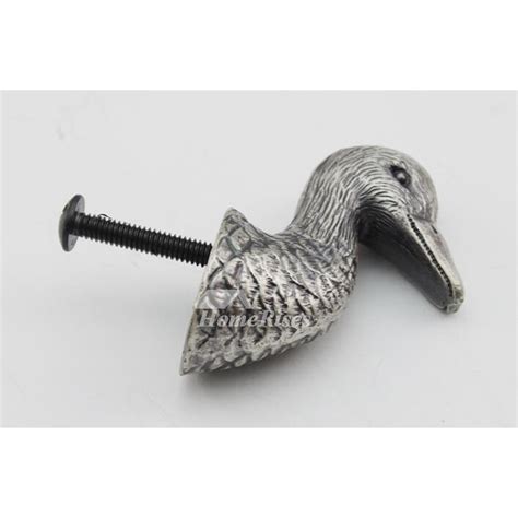 They feature a recessed panel door with smooth edge profiles and simple clean lines offering only the simplest of design elements. Decorative Duck Shaped Modern Drawer Pulls Cabinet Alloy