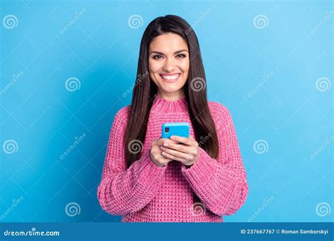 Photo Of Adorable Sweet Mature Woman Wear Pink Pullover Communicating Modern Device Isolated