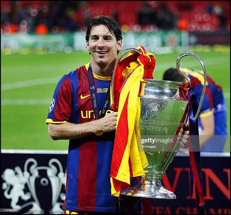 Lionel Messi With The Trophy After The Uefa Champions League Final